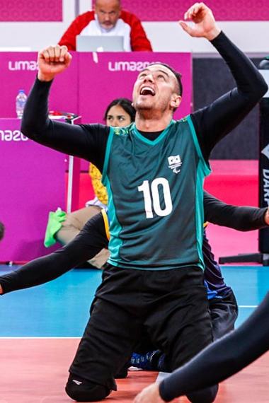 Brazilian Renato De Oliveira celebrates with his team after scoring a point during a sitting volleyball match against Costa Rica, held at Callao Regional Sports Village at the Lima 2019 Parapan American Games