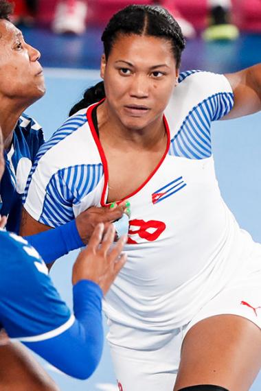 Lorena Tellez holds the ball during the match against Cuba 