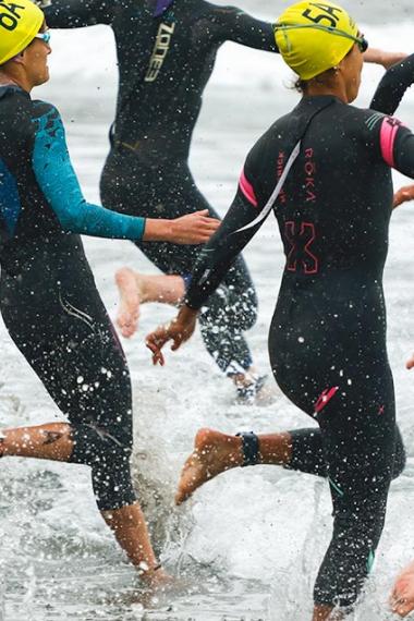Group of athletes start triathlon competition at Chorrillos Beach