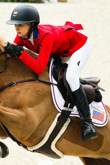 Athlete Eve Jobs from the United Stated jumps in the equestrian competition held at the Army Equestrian School