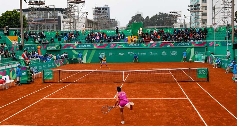 Veronica Cepede from Paraguay and Carolina Alves from Brazil in the Lima 2019 tennis competition held at the Lawn Tennis Club