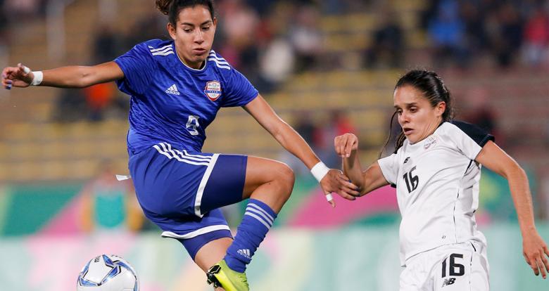 Paraguay’s Fabiola Sandoval faces off Costa Rican midfielder Katherine Alvarado for the women's football bronze medal at San Marcos Stadium