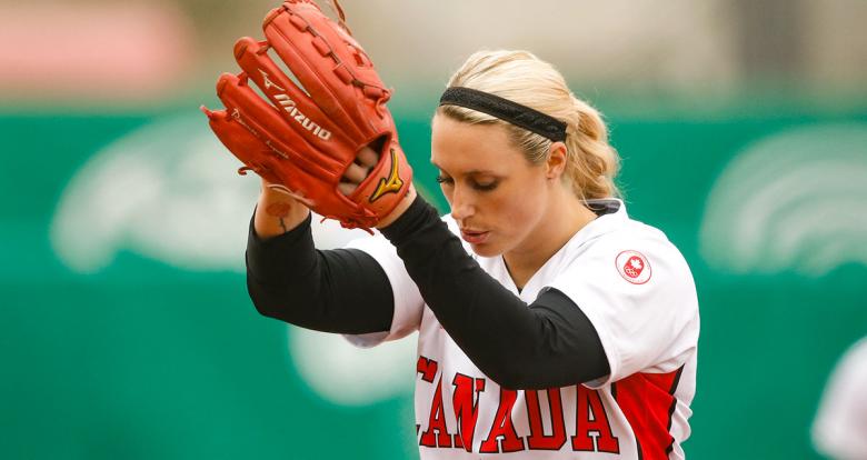 Danielle Lawrie from Canada holds the ball in a match against Mexico in the Lima 2019 women’s softball preliminary round held at the Villa María del Triunfo Sports Center