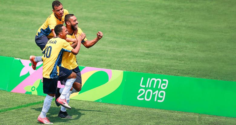 Brazilian players celebrate their goal in the football 7-a-side final against Argentina at Lima 2019, held at the Villa María del Triunfo Sports Center.