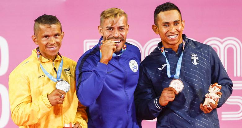 The Colombian Carlos Giraldo, the Salvadorian Yuri Rodriguez and the Guatemalan Jonathan Martínez proudly showing their medals	