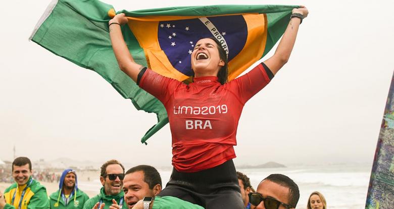 Chloe Calmon from Brazil celebrates her victory in surfing at the Lima 2019 Games, in Punta Rocas