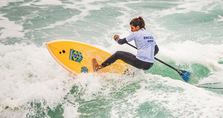 Nicole Pacelli from Brazil riding the waves in the women’s SUP surfing competition at the Lima 2019 Games, in Punta Rocas