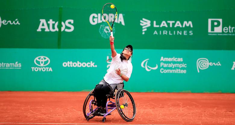 Carolina Moreno from Peru hits the ball in the wheelchair tennis match against Emmy Kaiser from the  USA at the Lawn Tennis Club