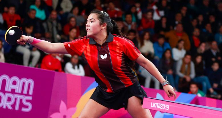 Melanie Díaz from Puerto Rico hitting the ball during table tennis match vs. Cuba held the National Sports Village – VIDENA, Lima 2019 Games .