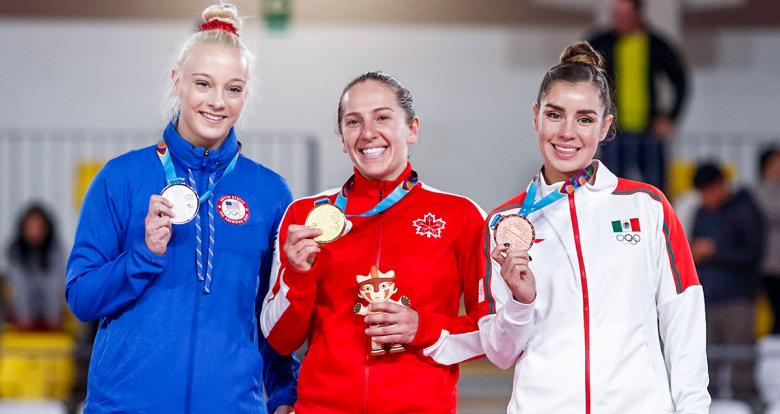 American Nicole Ahsinger, Canadian Samantha Smith and Mexican Dafne Navarro Loza with their medals in ceremony for women’s trampoline gymnastics at the Lima 2019 held at the Villa El Salvador Sports Center