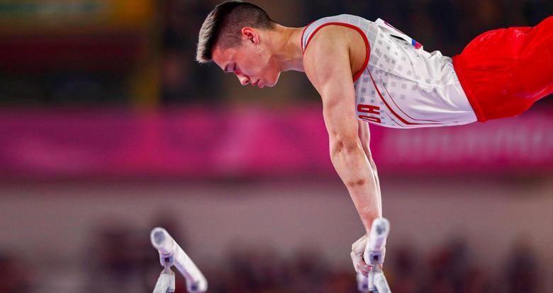 Justin Karstadt from Canada competes in the men’s artistic gymnastics event at Lima 2019, in the Villa El Salvador Sports Center.