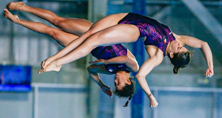 Alejandra Orozco and Gabriela Agundez from Mexico soar through the sky in the Lima 2019 10 m synchronized diving competition at the National Sports Village – VIDENA.