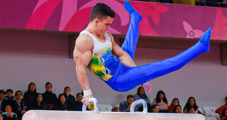 Brazilian Caio Souza competes in the men’s artistic gymnastics event at Lima 2019, in the Villa El Salvador Sports Center.