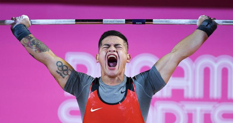 Peruvian Oscar Terrones competes in the men’s 73 kg weightlifting event held at the Chorrillos Military School at the Lima 2019 Games.	