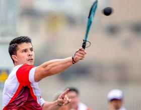  Peruvian fronton player Cristopher Martínez about to strike the ball back to Mexican Isaac Pérez during fronton qualification at the Villa María del Triunfo Sports Center, at the Lima 2019 Pan American Games