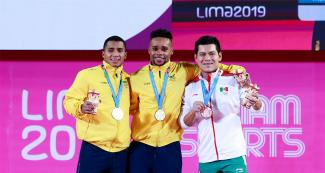 Winners show their medals