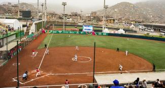 Mexico and Argentina facing off in the softball field to earn a victory