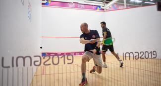  Piza Camiruaga plays against his opponent from Mexico in a squash match