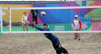 Mexican Juan Ramón Virgen tries to hit the ball against Nicaragua