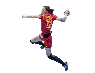 Athlete about to attack during a handball match. 