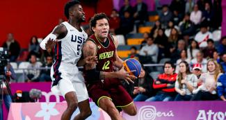 Michael Carrera steals the ball from the USA team 