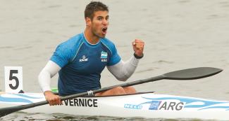 Argentinian Agustín Vernice, shouts victory in canoe sprint