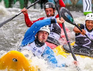 Paddlers compete in an extreme canoe slalom event. 