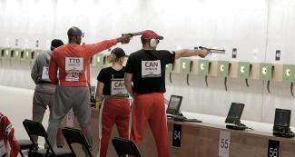 Group of competitors about to shoot 
