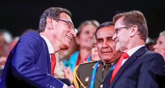 The President of Peru Martín Vizcarra shakes hands with the President of the Lima 2019 Organizing Committee Carlos Neuhaus at the Lima 2019 Opening Ceremony