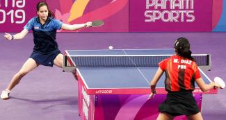 Daniela Fonseca of Cuba and Melanie Díaz of Puerto Rico face off in the Lima 2019 table tennis competition at the National Sports Village – VIDENA