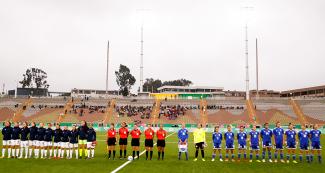 Paraguay and Costa Rica women’s football teams get ready to start the match for the bronze medal at San Marcos Stadium