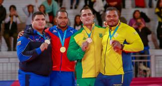 Pedro Pineda de Venezuela (plata), Andy Granda de Cuba (oro) y David Moura de Brasil y Freddy Figueroa de Ecuador (bronce) posan orgullosos con sus medallas de judo en categoría +100 kg en los Juegos Lima 2019 en la Villa Deportiva Nacional – VIDENA.