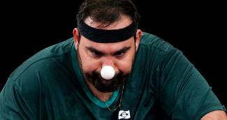 Brazilian Claudio Moura focused on the Para table tennis ball at the National Sports Village - VIDENA at Lima 2019.