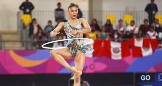 Brazilian Barbara Domingos competing in individual rhythmic gymnastics at Villa El Salvador Sports Center at the Lima 2019 Games