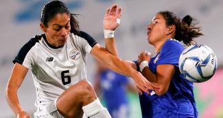 Costa Rica’s Carol Sanchez faces off Paraguay’s Fabiola Sandoval for the Lima 2019 women's football bronze medal at San Marcos Stadium