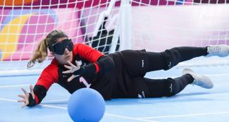 Canadian Maryam Salehizadeh reaches the ball during the goalball match against Peru at the Lima 2019 Parapan American Games in the Callao Regional Sports Village