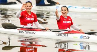 Canadian paddlers Alanna Bray-Lougheed and Andréanne Langlois greeting after winning K2 women 500m event at Lima 2019 