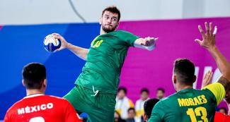 Brazilian Raul Nantes makes a spectacular play during handball match at the National Sports Village - VIDENA 