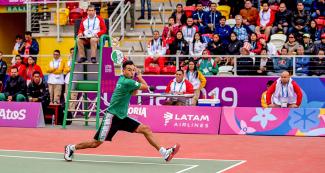  Mexican fronton player Isaac Pérez about to strike the ball back to Peruvian Cristopher Martínez during fronton qualification at the Villa María del Triunfo Sports Center, at the Lima 2019 Pan American Games