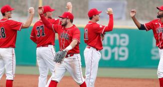 Each of the Canadian baseball team members celebrates after winning Colombia in the preliminary round at Lima 2019 