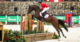 Noé Ben Lamine Díaz of Peru in the Lima 2019 jumping competition at the Army Equestrian School