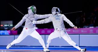 Natalia Botello from Mexico does maneuver in the Lima 2019 fencing competition held at the Lima Convention Center