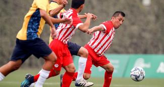 Renzo Loyola from Peru face off Brazil in Lima 2019 football 7-a-side match, held at the Villa María del Triunfo Sports Center