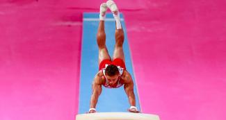 Dominican Audrys Nin showing why he won gold medal in vault event at the Villa El Salvador Sports Center