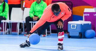 Alexis Gonzalez from Mexico with the ball in the goalball match against Brazil held at the Callao Regional Sports Village