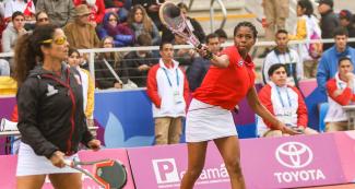 Peru’s Claudia Suarez and Cuba’s Wendy Durand in action during fronton match at the Lima 2019 Games, held at the Villa María del Triunfo Sports Center