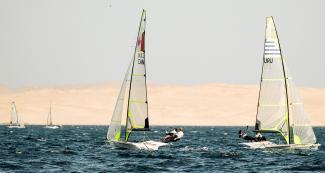 Athletes participating in Lima 2019 men’s skiff event at the Paracas Bay.