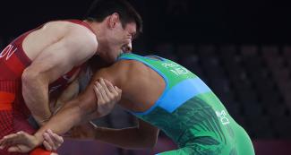 Ildar Hafizov from the United States faces off Emilio Perez from Mexico in Greco-Roman wrestling at the Callao Regional Sports Village