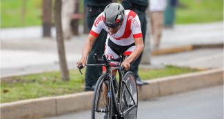 Peruvian Israel Hilario competing in the Para cycling road C1-5 time trial final held at Costa Verde, San Miguel.