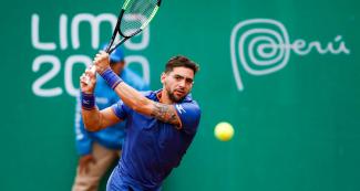 Argentinian Guido Andreozzi competes against Facundo Bagnis for the bronze medal at the Lima 2019 Games at Club Lawn Tennis